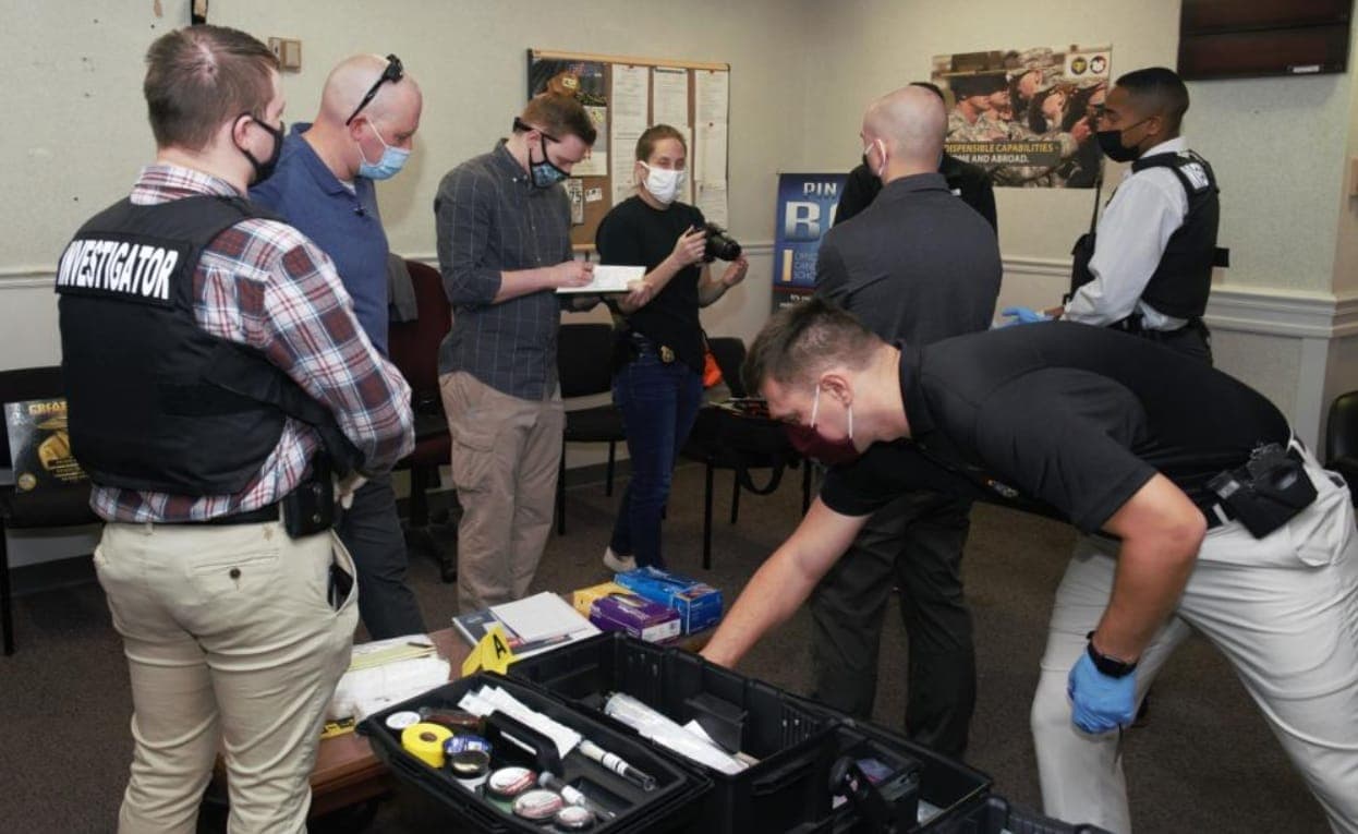 Special Investigations (7S0X1) Airmen at work