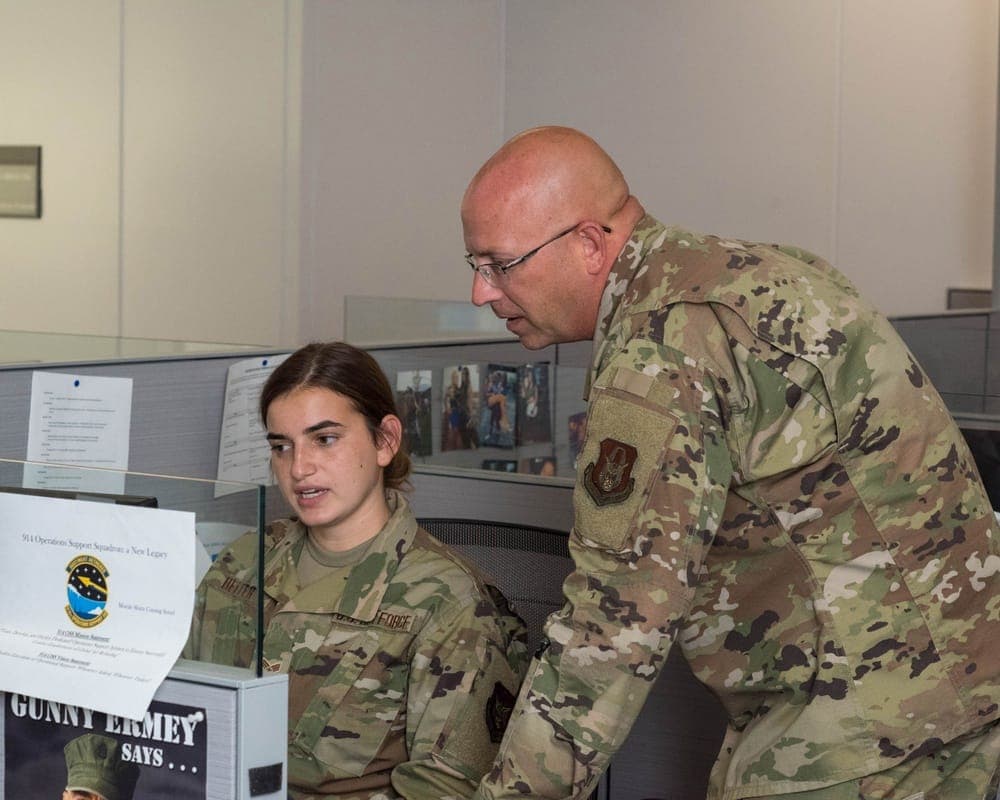 Air Force member reviewing mobilization orders paperwork