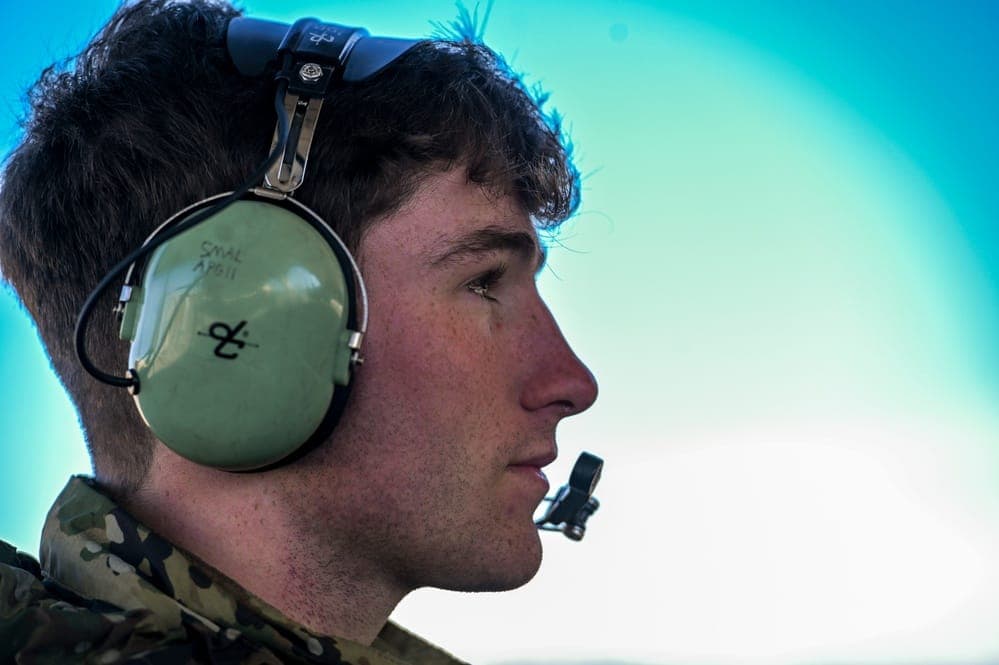 Air Force crew chief preparing to launch an F-15E Strike Eagle sortie on the flightline