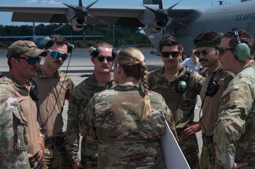 Airmen arriving at an overseas Air Force base for a new assignment