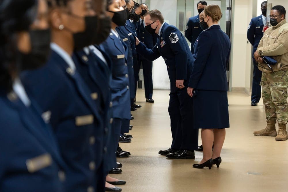Air Force service dress uniform displaying a ribbon rack with multiple rows of decorations