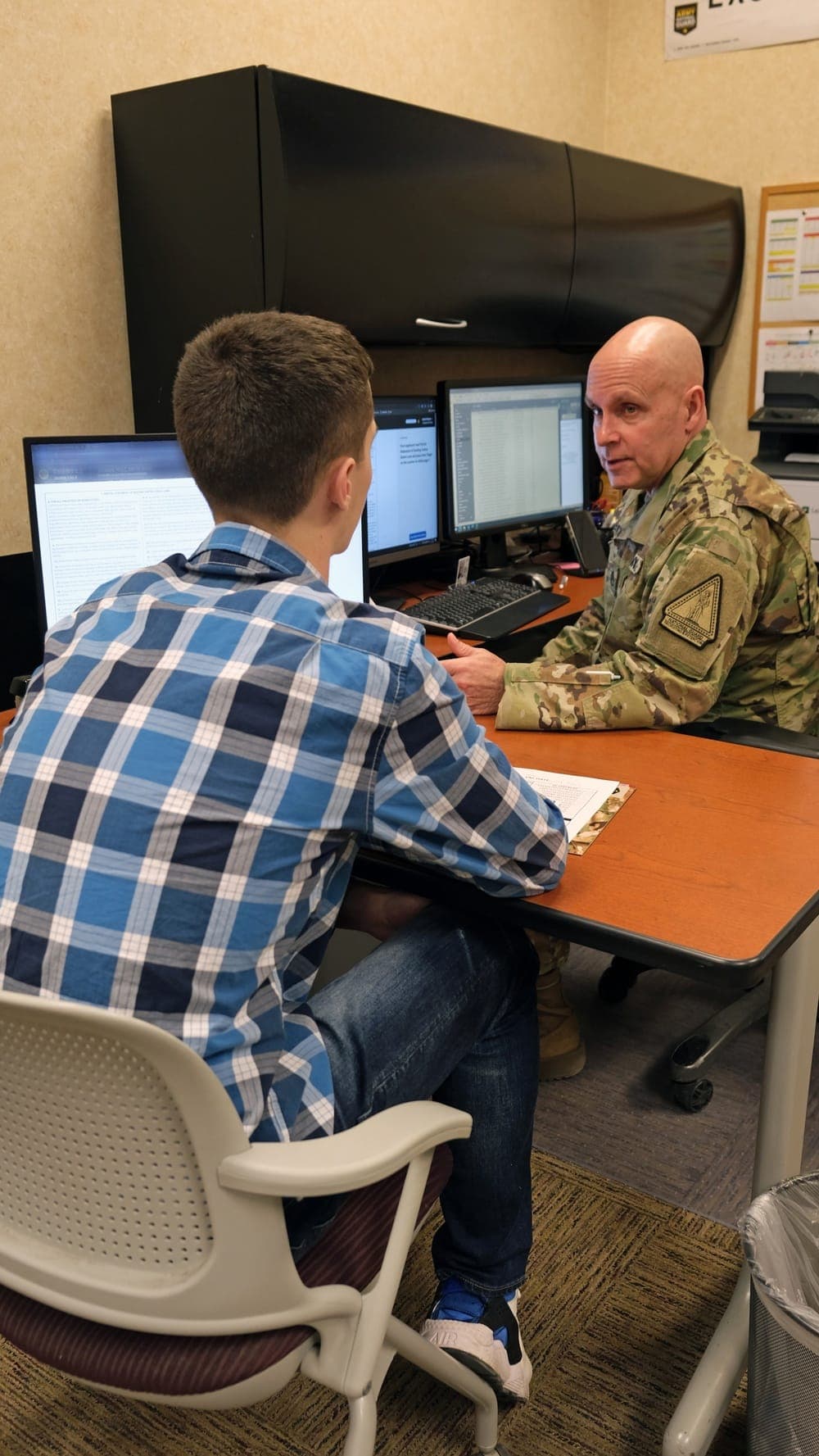 Air Force applicant meeting with a guidance counselor at MEPS to discuss career options