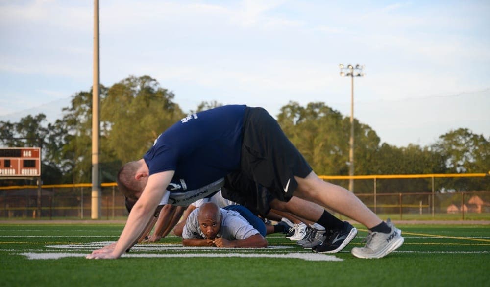 Air Force DEP members participating in a group physical training session