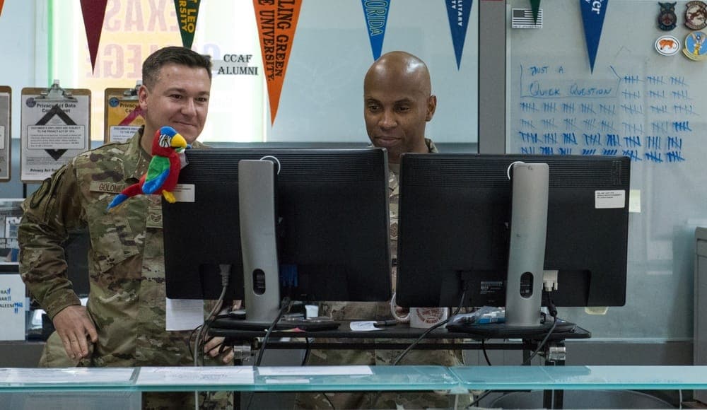 An Airman studying coursework at a base education center