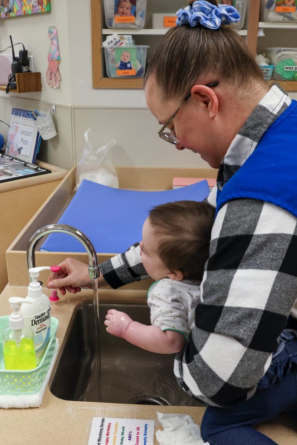 Children and staff at an Air Force Child Development Center during an educational activity