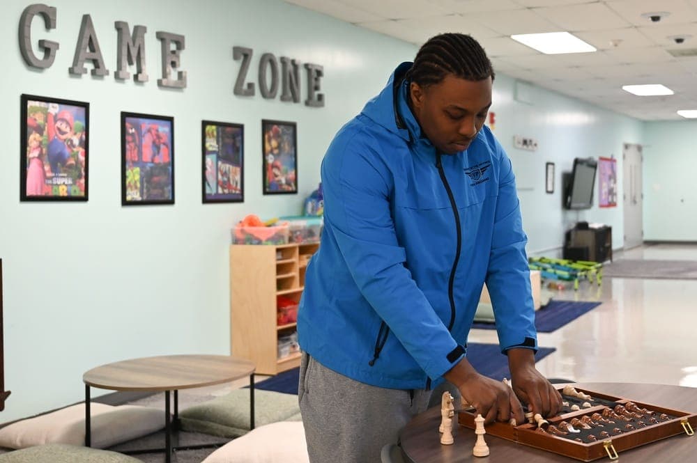 Teens participating in activities at an Air Force Youth Center