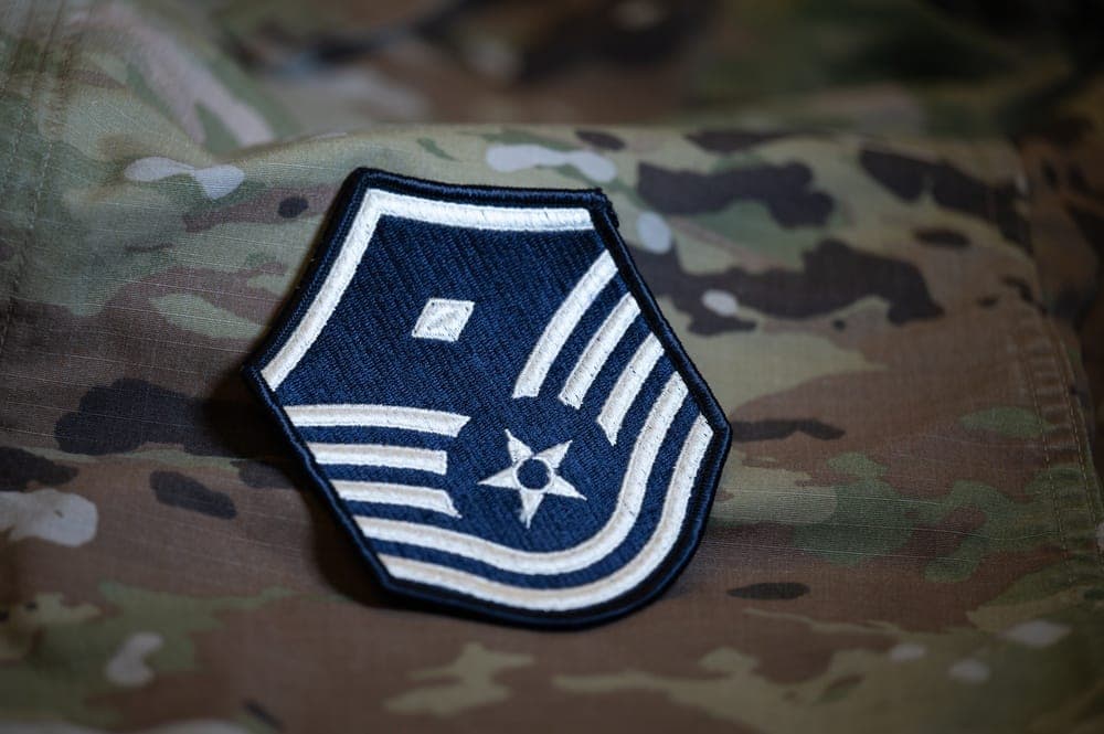 First Sergeant wearing the diamond rank insignia on the OCP uniform
