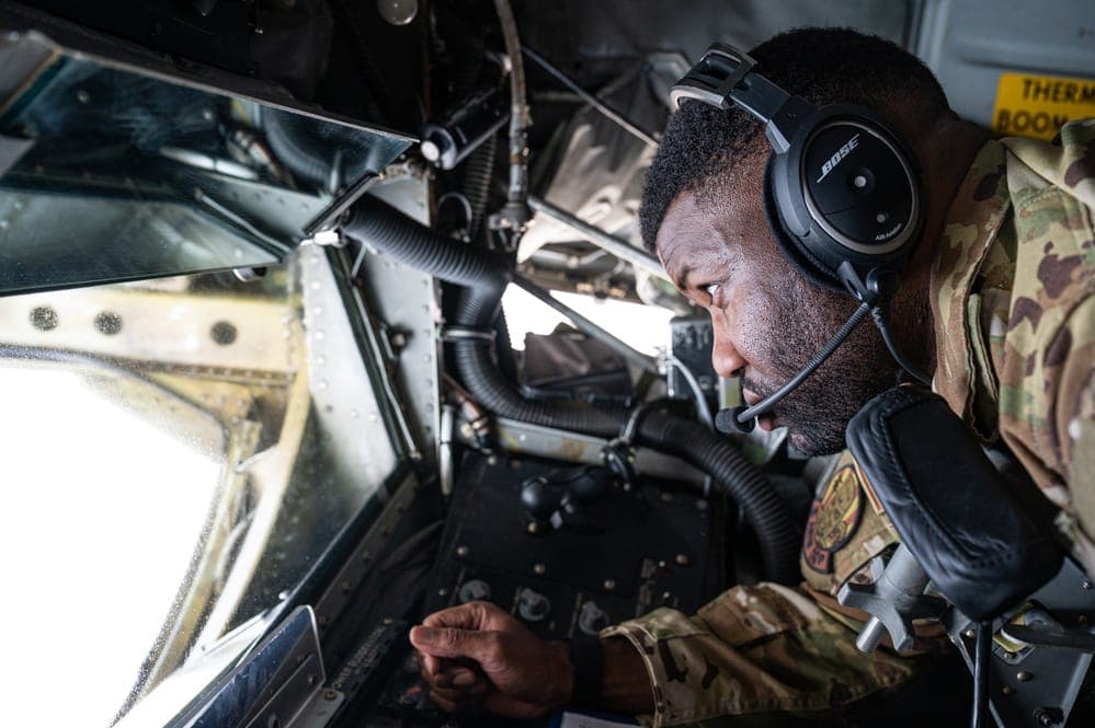 Air Force boom operator refueling from KC-135 Stratotanker during operations