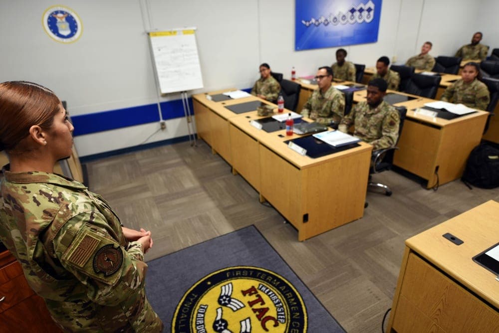Airmen participating in a First Term Enlisted Course classroom discussion