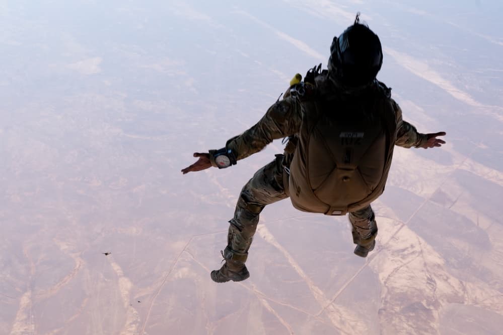 Air Force Pararescueman performing military free fall from HC-130J