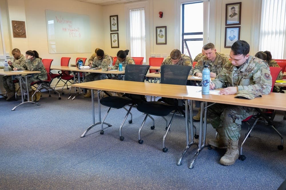 Airman receiving a financial readiness briefing at an Air Force base
