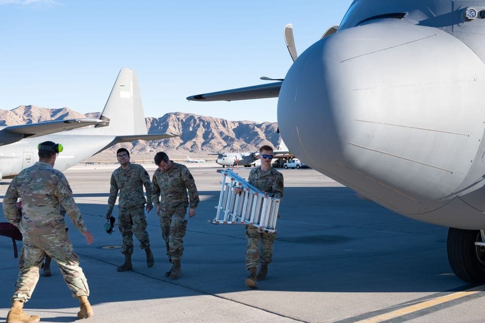 Air Force maintenance Airmen working on aircraft on the flight line