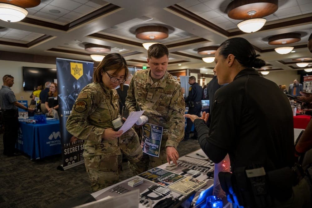 Military spouses networking at an installation career fair