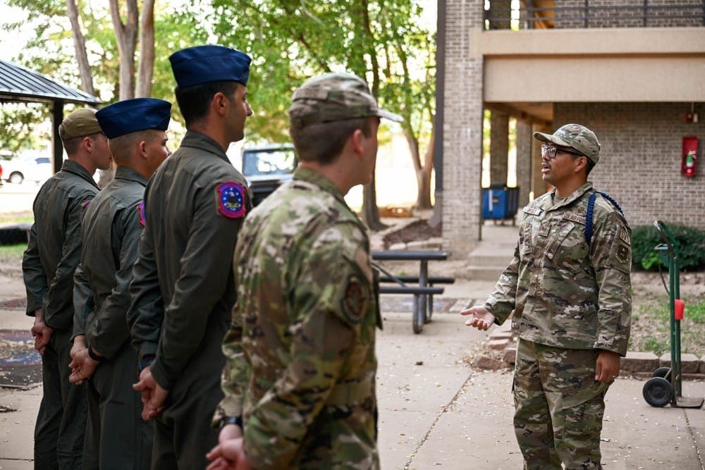 Military Training Leader conducting counseling session with an Airman