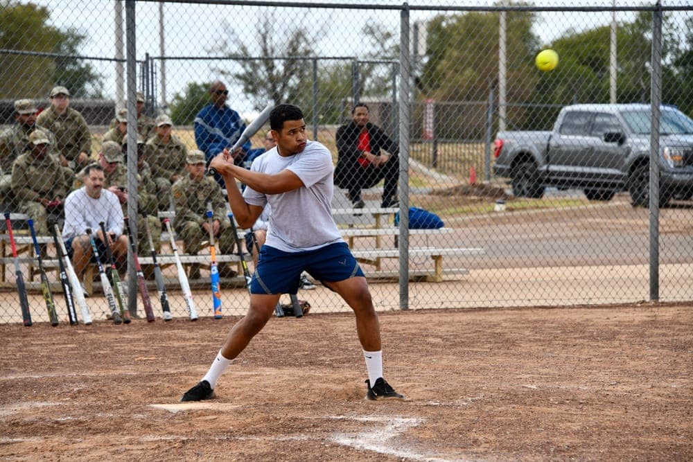 Airmen competing in an intramural sports day event at an Air Force base