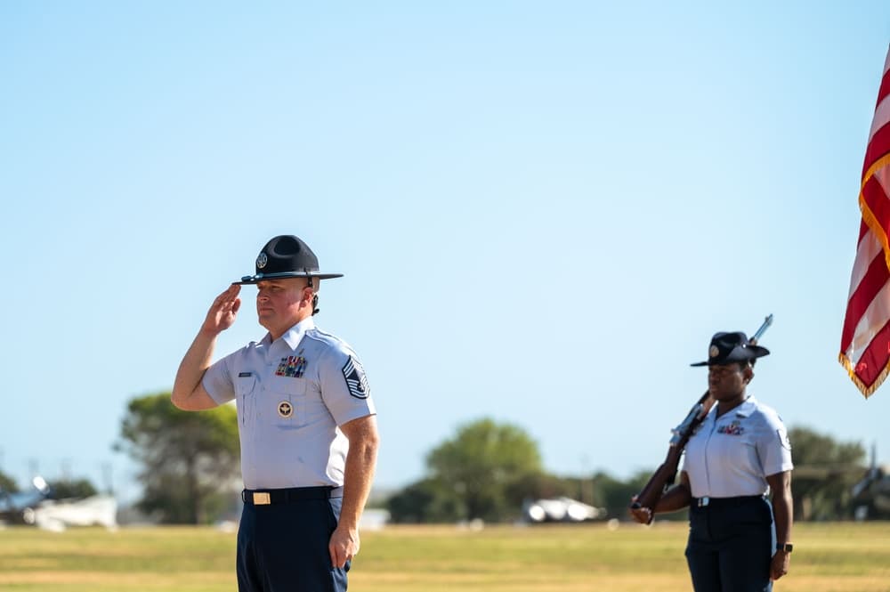 Airmen at BMT graduation at Lackland AFB, marking the start of their military pay
