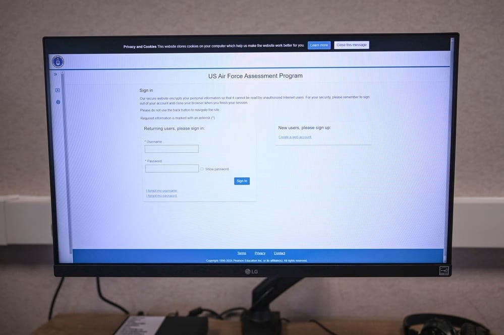 Air Force Airman taking electronic WAPS promotion test at computer station