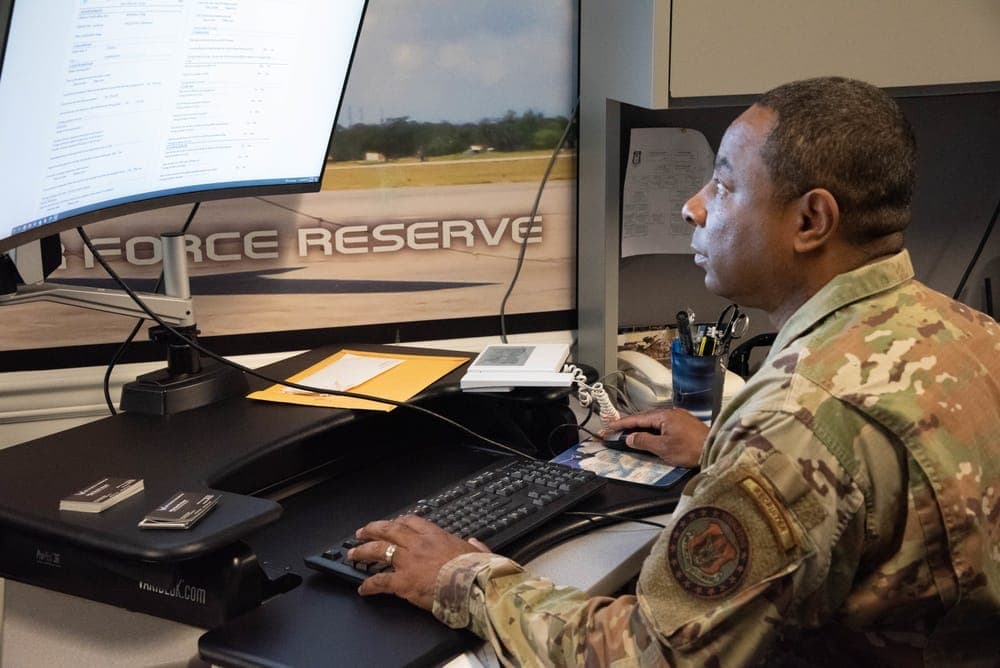 Air Force recruiter reviewing paperwork with an applicant
