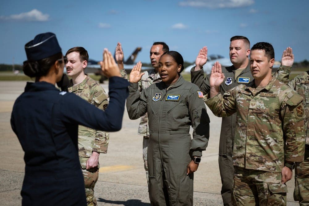 Air Force Airman taking the oath of reenlistment during a ceremony
