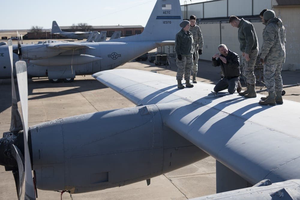 Air Force technical training instructor working one-on-one with a student at Sheppard AFB