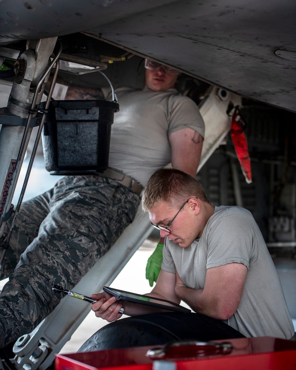 Airmen conducting hands-on aircraft maintenance training at Sheppard Air Force Base