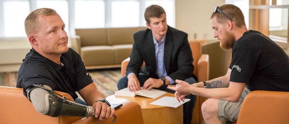 Veteran student on a college campus utilizing GI Bill education benefits