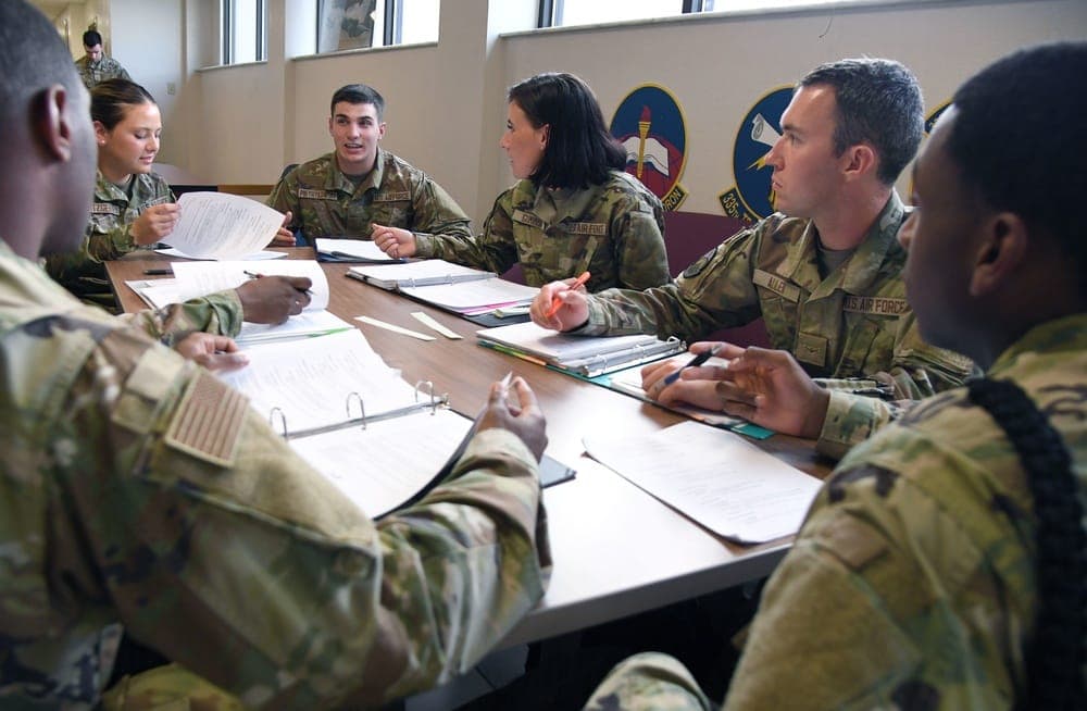 Air Force technical training students studying in a classroom environment at Keesler AFB